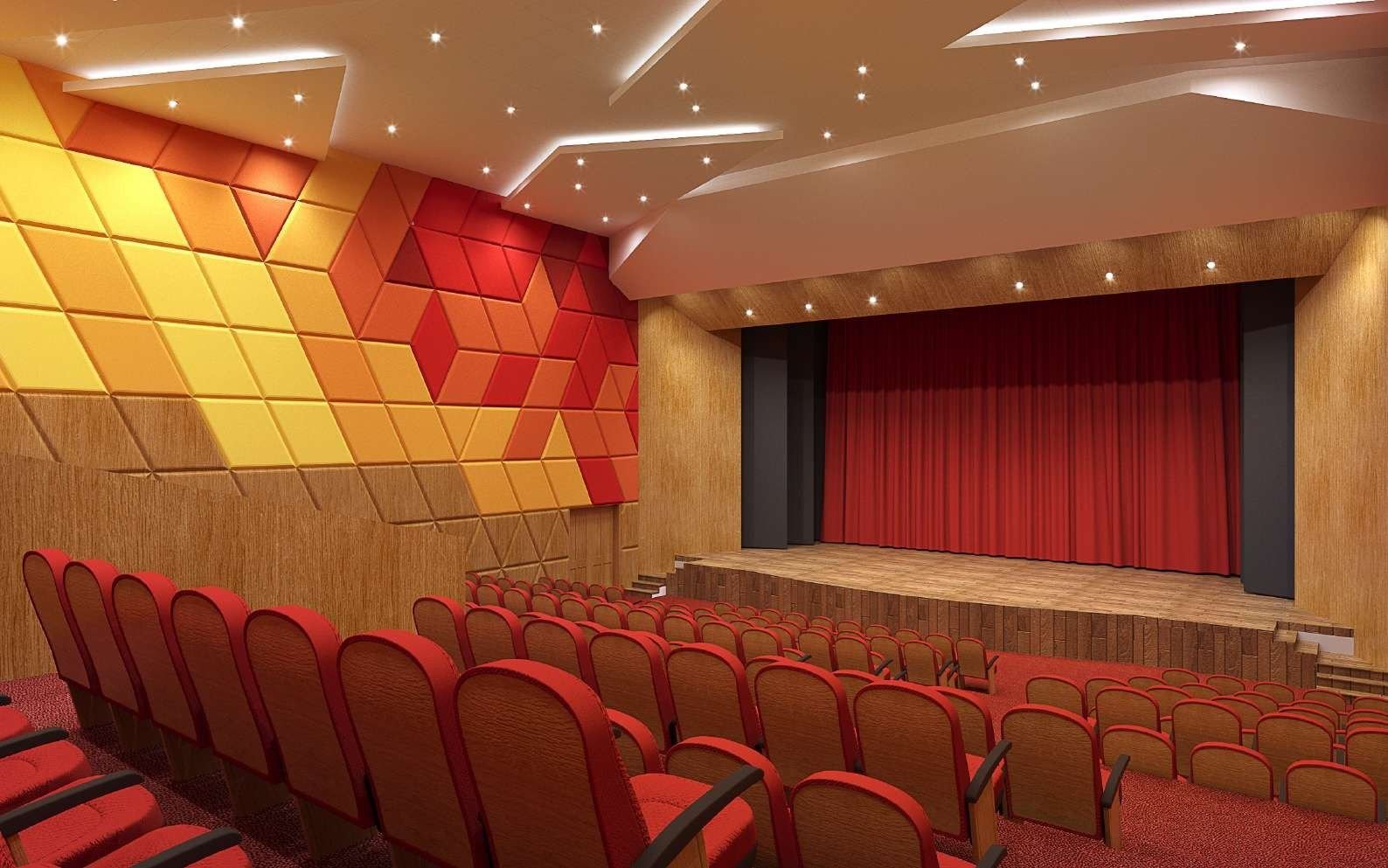 Design visualisation of an auditorium with red, orange and yellow geometric acoustic wall panels, red seats and a stage with red curtains