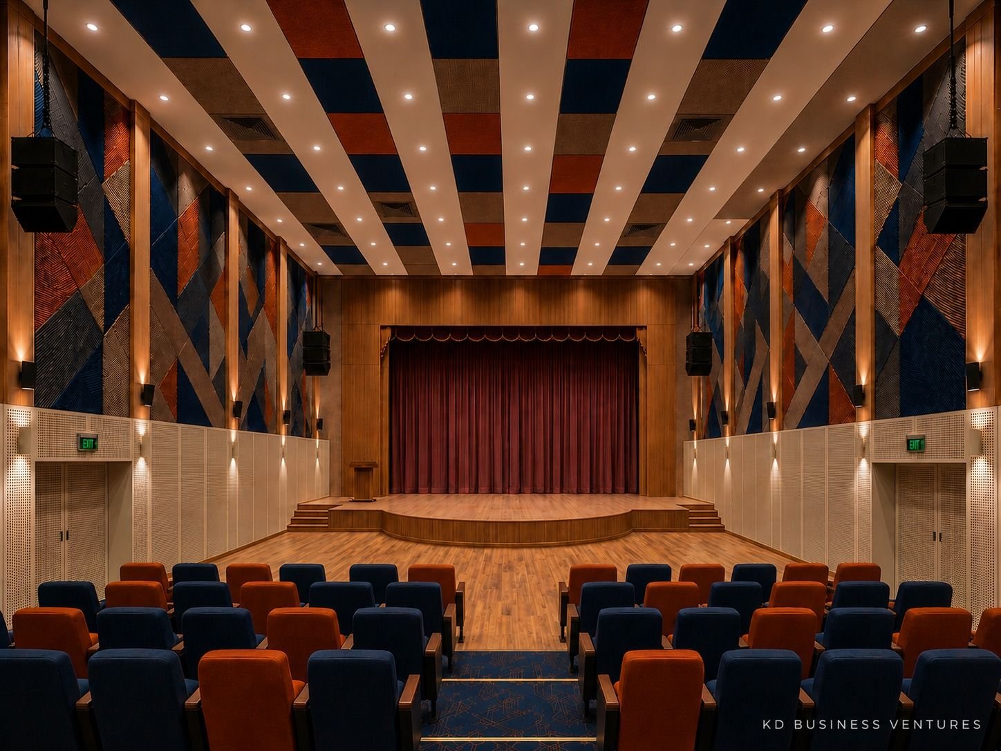Auditorium with a central stage, navy and rust acoustic panels, striped ceiling and tiered seats