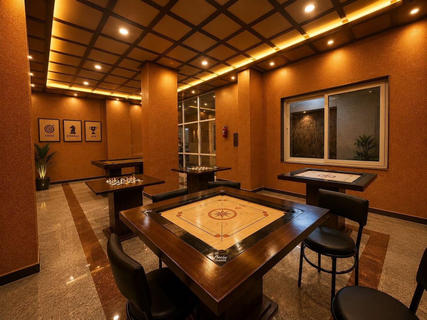 Club lounge at AIS Residency with a carrom table, chess tables, textured warm walls and a timber ceiling grid