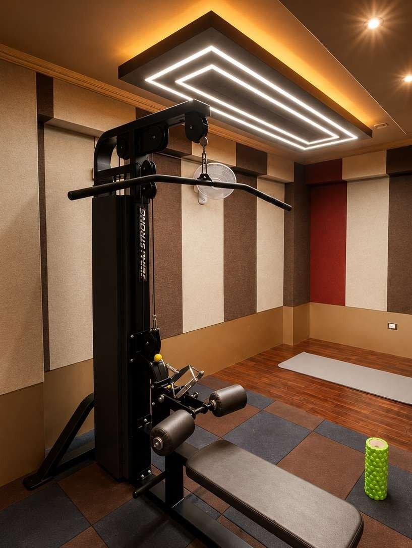 Cable machine against panelled walls in the AIS Residency gymnasium